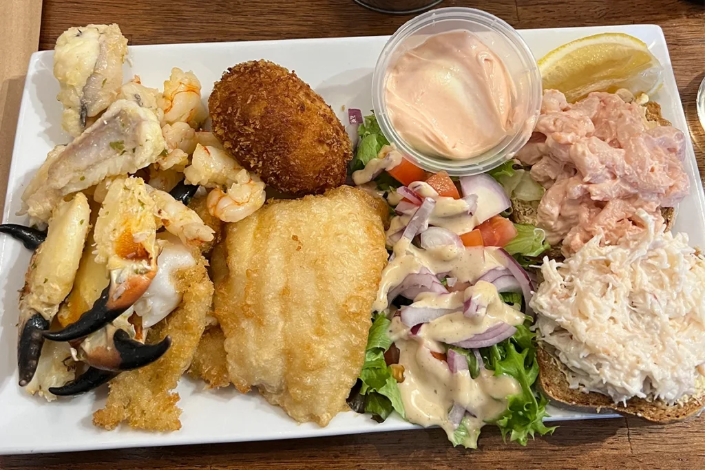 Fisherman's feast at O'Keefes Fisherman’s Bar. Plate full of variety of seafood.